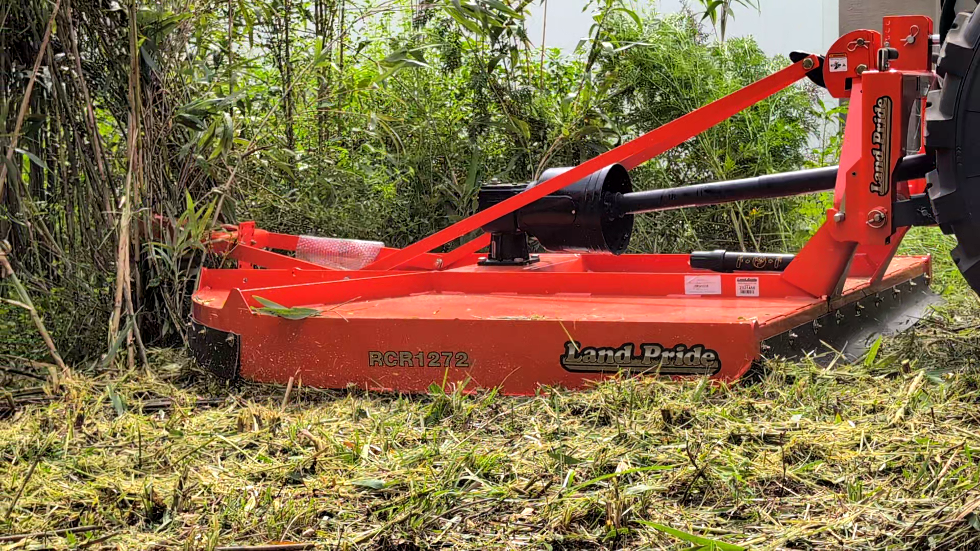 Tractor doing bush hogging